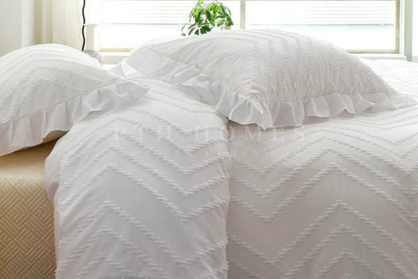 Elevate Your Bedroom Decor with PTH Home's Chevron Tufted Ruffles Duvet Cover Set in White and Orange