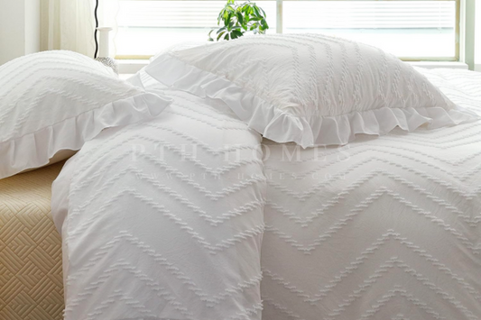 Elevate Your Bedroom: Introducing the Chevron Tufted Duvet Cover with Ruffles by PTH Homes